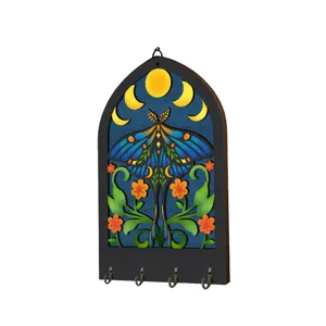 Wooden moon moth key holder for wall decor, bohemian hanging organizer with four hooks for entryway.