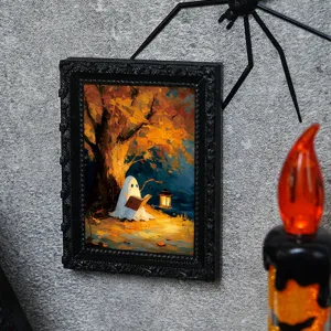 Detailed view of the Halloween ghost magnetic photo frame mounted on wall with festive decor.