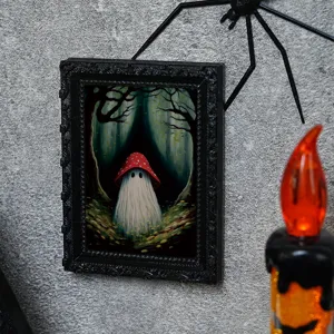 Close-up detail of the Halloween ghost mushroom magnetic photo frame hanging on wall.