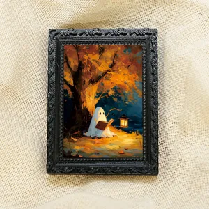 Close-up detail of the Halloween ghost fridge magnet photo frame featuring a cute autumn design.