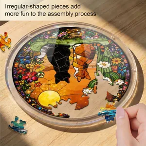 Close-up view of the round stained glass style cat puzzle with colorful floral design.