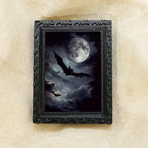Marco de fotos magnético murciélago Halloween gótico, detalle de borde negro tallado.