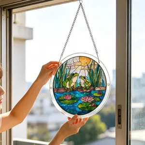Acrylic suncatcher window hanging featuring cute frog and lotus pond design with chain.