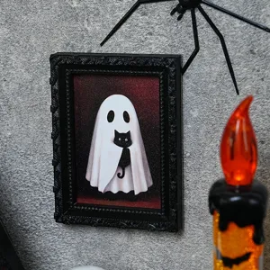Vue détaillée du cadre photo fantôme chat noir d'Halloween aimant de réfrigérateur, fête.