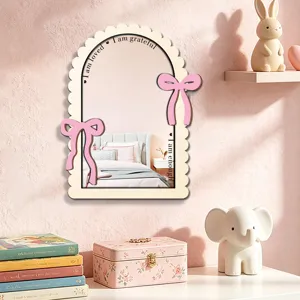 Wooden acrylic arched mirror with pink bows and inspiring text for home bedroom wall decor