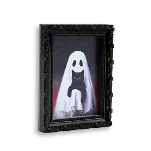 Détail en gros plan du cadre photo magnétique chat noir fantôme 3D d'Halloween décor.