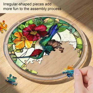 Stained glass hummingbird acrylic puzzle detail shot, vibrant floral pattern window suncatcher.