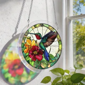 Stained glass style acrylic suncatcher window hanging with hummingbird and floral pattern.