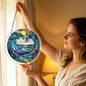 Detailed shot of a round acrylic suncatcher with colorful wave art hanging by the window.