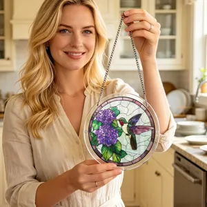 Stained acrylic window hanging featuring a vibrant hummingbird and purple hydrangea.