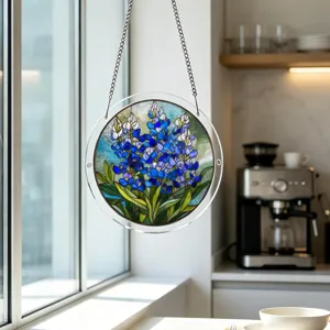 Stunning acrylic suncatcher hanging ornament with blue flower design for window decor.