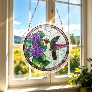 Round acrylic window suncatcher hanging decoration featuring a hummingbird and floral motif.
