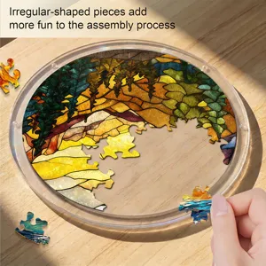 Detail view of the stained glass acrylic puzzle piece being assembled on a round frame.