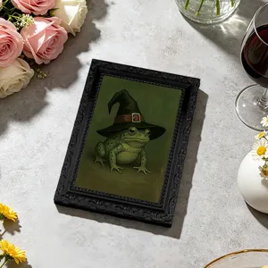 Detail view of vintage frog witch photo frame fridge magnet for home kitchen decor