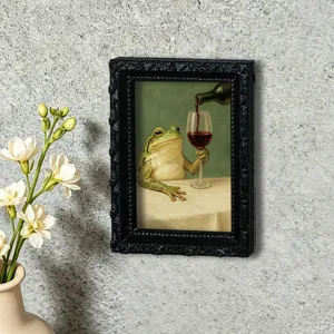 Detailed view of vintage frog photo frame fridge magnet, retro wall decor accent.