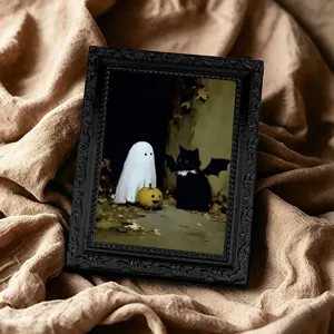 Gros plan sur les details du cadre photo magnetique fantome chat halloween pour decoration.