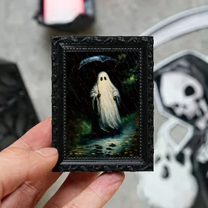 Miniature Halloween ghost picture frame fridge sticker detail view, spooky home decor.
