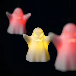 Halloween hanging LED ghost light, glowing party decor detail view for festival events