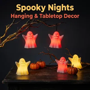 Halloween glowing ghost LED lights hanging and tabletop decor for party holiday spooky ambiance.