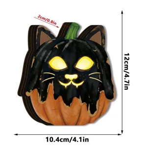 Halloween wooden glowing cat pumpkin ornament detail view, retro holiday tabletop decor.