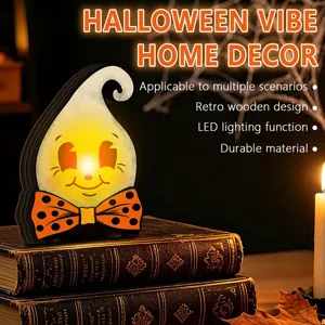Detailed close-up of the retro wooden ghost LED light ornament with warm glowing face.