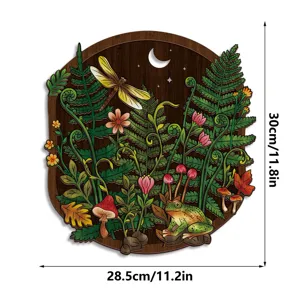 Detailed view of the creative wooden wall art featuring fern leaves, frog, and dragonfly.