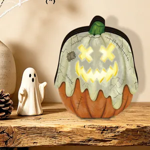 Halloween wooden LED glowing pumpkin ghost ornament tabletop rustic holiday home decor detail.