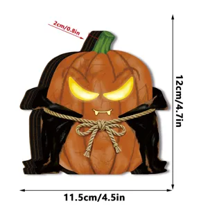 Halloween wooden pumpkin ornament detail view showcasing LED glowing eyes, cape, and size dimensions.