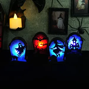 Halloween LED glowing tombstone lights set, perfect spooky party decoration and haunted house props.