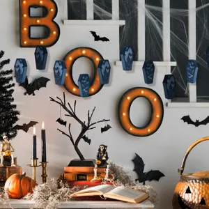 Halloween hanging LED coffin lights detail shot with spooky holiday party decoration setup.