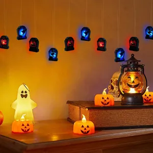 Halloween hanging LED tombstone coffin party string decoration with glowing pumpkin lamps.