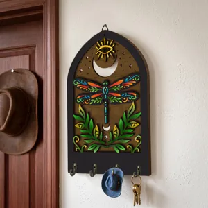 Bohemian wooden key holder wall decor with dragonfly pattern for home organization.