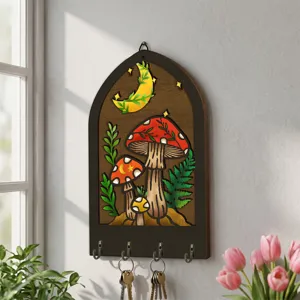 Wooden wall key holder featuring cute mushroom and moon botanical design with metal hooks.