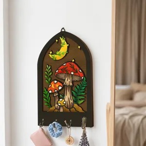 Bohemian wooden key holder wall mount with mushroom moon design and hooks for home decor.