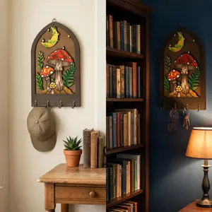 Detailed view of bohemian wooden key holder featuring carved mushroom and moon design for wall.
