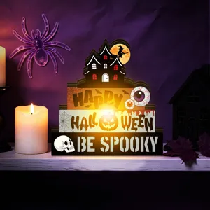 Halloween tiered wooden block table decoration with LED light, spooky castle and pumpkin decor.