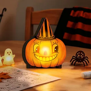 Detailed view of vintage wooden pumpkin glowing Halloween ornament closeup tabletop decor.