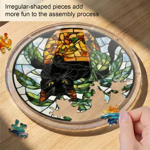 Acrylic stained glass black cat round puzzle window hanging suncatcher with irregular pieces.