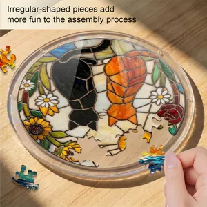 Detailed view of the stained glass cat acrylic puzzle suncatcher showing irregular pieces.