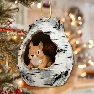 Christmas tree hanging ornament featuring a cute red squirrel inside a birch bark hollow trunk design.