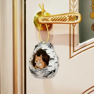 Detailed close-up view of the cute squirrel tree hole hanging pendant, showcasing fine carving.