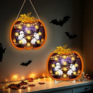 Halloween LED wooden pumpkin sign with cute ghost gaming illustration, glowing fairy lights.