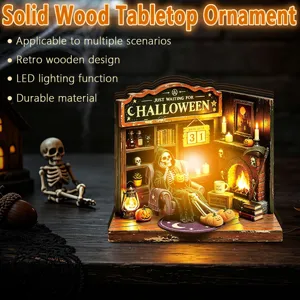 Detailed view of the retro wooden Halloween tabletop ornament featuring warm LED lighting.