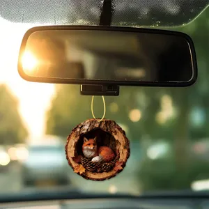 Detailed view of car rearview mirror hanging acrylic ornament featuring cute fox in tree hollow.