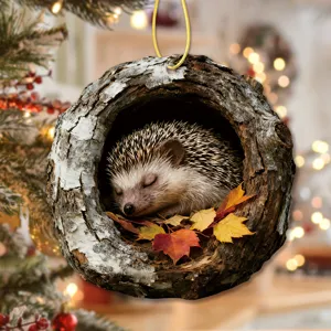 Christmas tree hanging ornament featuring a cute sleeping hedgehog in a natural tree hole.