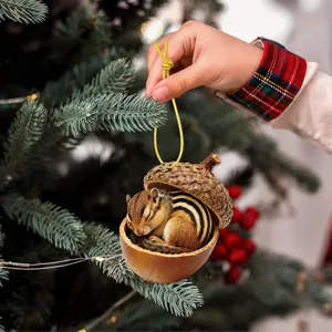 Cute chipmunk in acorn Christmas tree hanging ornament holiday party decoration detail view