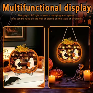 Halloween pumpkin light detail showing ghost illustrations and warm LED illumination.