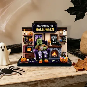 Halloween wooden tabletop decor detail showing glowing fireplace and Frankenstein figure.