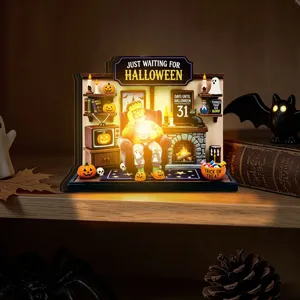 Halloween light-up wooden desktop decoration featuring Frankenstein scene with warm LEDs.