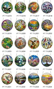 Round acrylic suncatcher window hanging grid featuring various colorful animal and landscape art.
